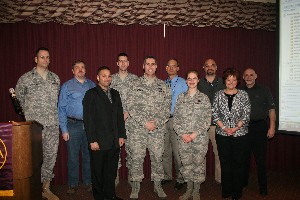 New chapter officers announced at the February meeting include (l-r) Lt. Col. John Jurgensen, USAF, vice president for awards; Roy Nielsen, webmaster; Kashif Janjua, vice president for programs and arrangements; Staff Sgt. James Gordon, USAF, webmaster; Col. Scott Merrell, USAF, chapter president; George Visnieski, vice president for membership; 2nd Lt. Jennifer Kannegaard, USAF, vice president for publicity; Marshall Guillory, chapter executive vice president; Renee Taylor, chapter vice president for special projects; and Lou Bianco, treasurer.